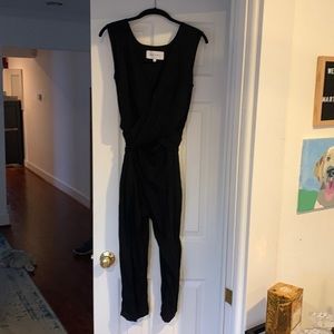 Black linen jumpsuit with adjustable top ties